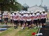 SV Captains lead the varsity onto the field.