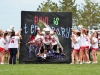 Britt Vernon breaks through the banner.