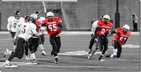 #24 Nate Bond followed blocks from #65 Gregg Ballard and #53 Russell Stone before stepping out of bounds to stop the clock.