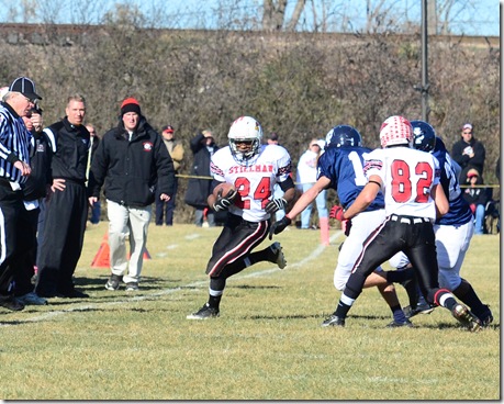 Bond up the sideline as SV coaches Lalor and Rempfer look on.