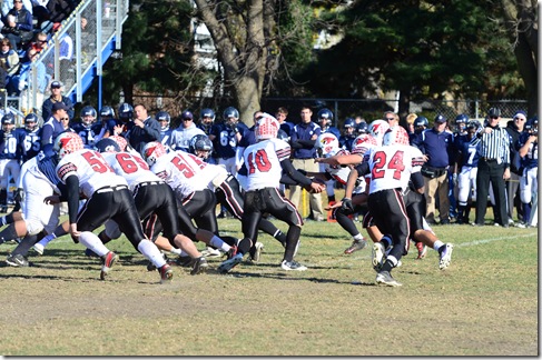 Stillman's linemen lean forward.