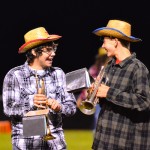 Band members enjoyed being together in the half-time show. Band members enjoyed being together in the half-time show.