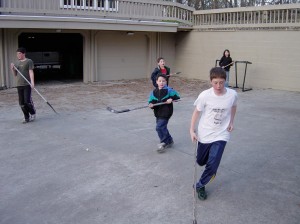 Children played outside in our cul de sac largely because one of them led the others. Children played outside image of children playing street hockey.