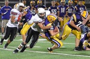 Jared Hoey sacks Mendota's quarterback.